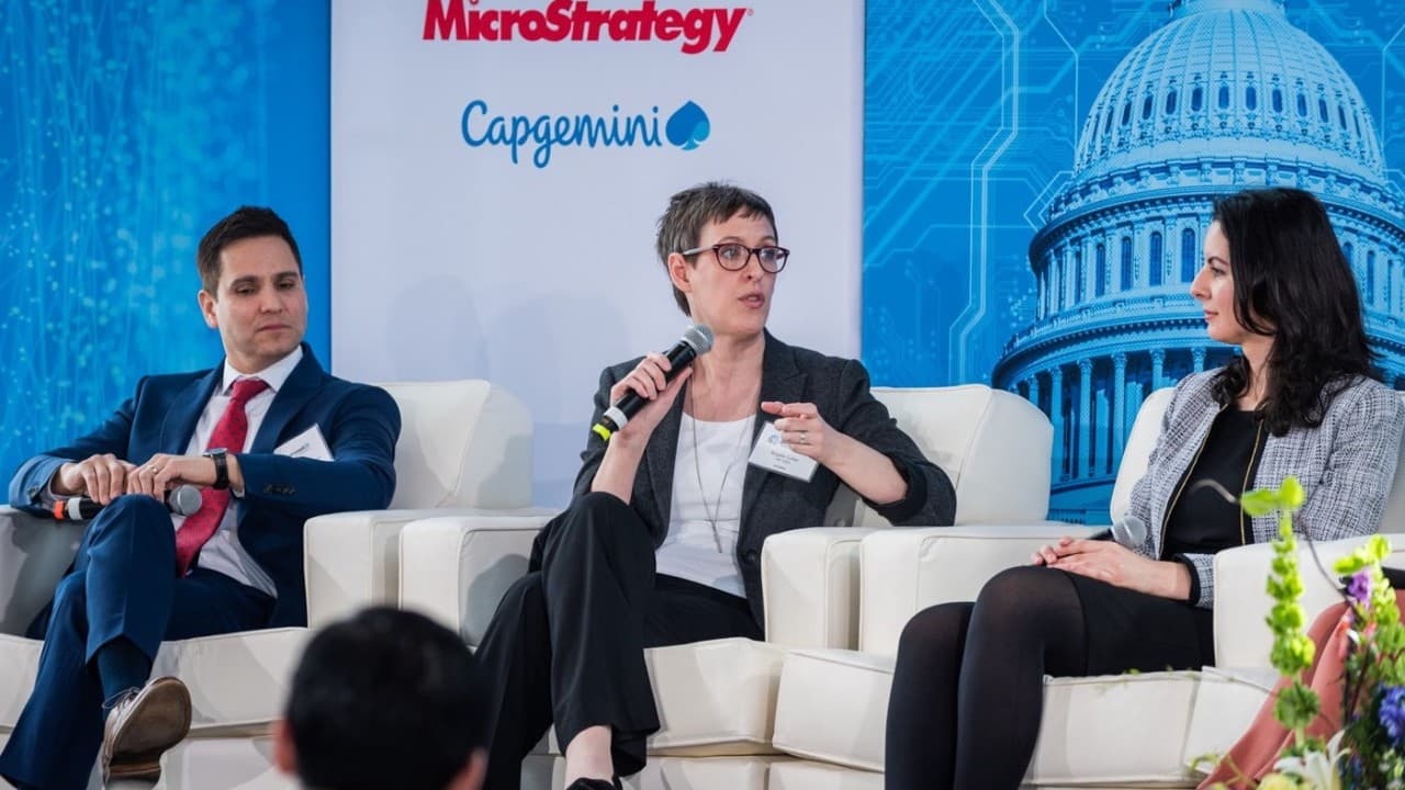 Nava Program Director Angela Colter speaks on a panel on a conference.